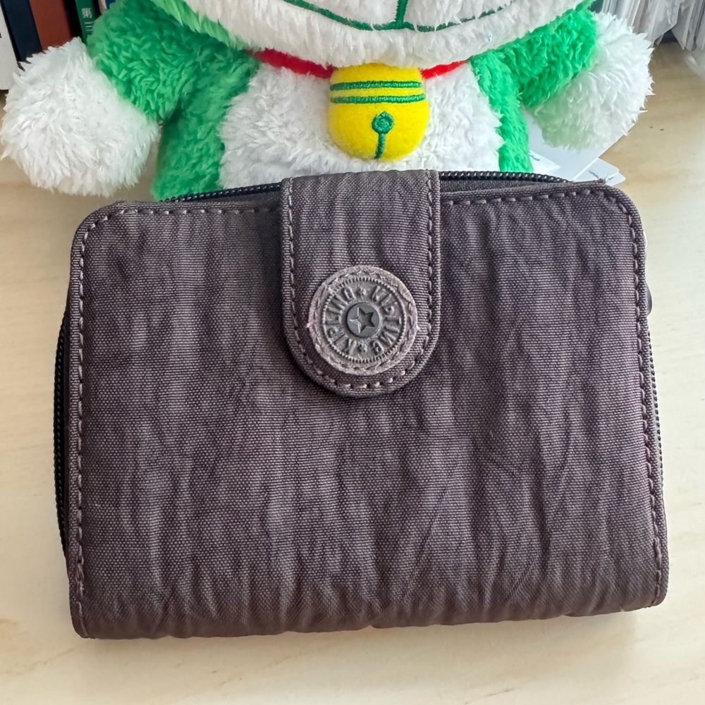 Kipling 4”x5” brown folding zip around and snap wallet